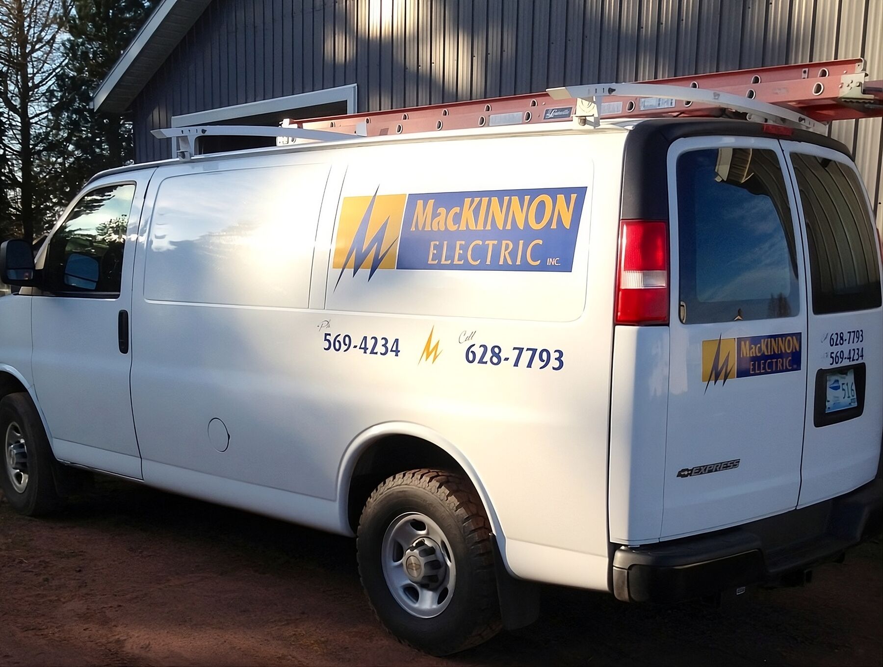 MacKinnon Electric service van with company lettering